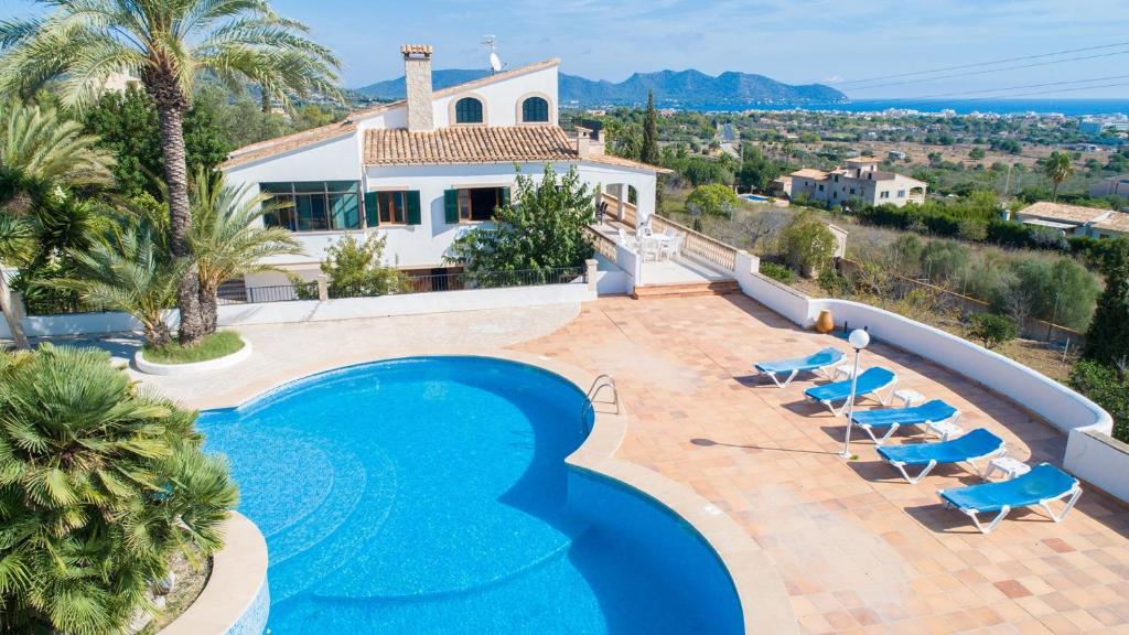 an image of a villa with a swimming pool at Na Penyal Ref 246 in Cala Millor