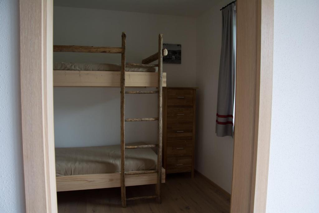 Postel nebo postele na pokoji v ubytování Bramsauerhof