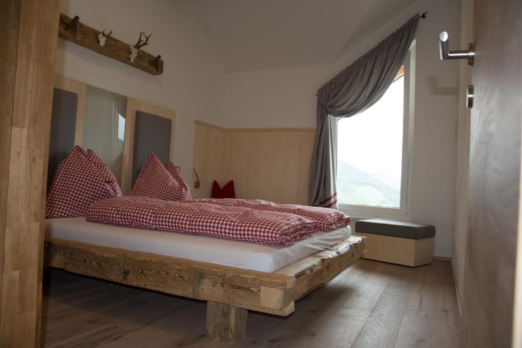 Postel nebo postele na pokoji v ubytování Bramsauerhof
