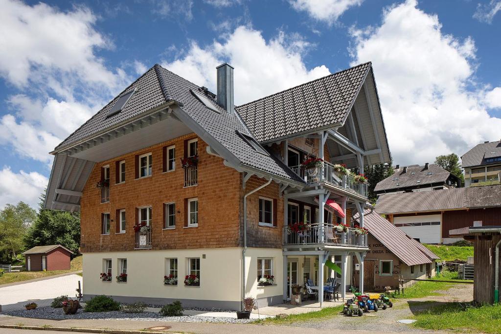 a large building with a roof on top of it at Sonnerhof Hofsgrund in Oberried