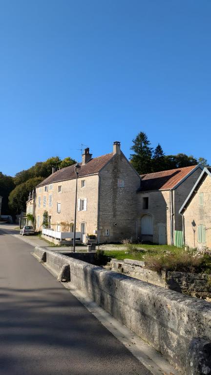 a row of houses on the side of a road at Gite de scène in Chamesson