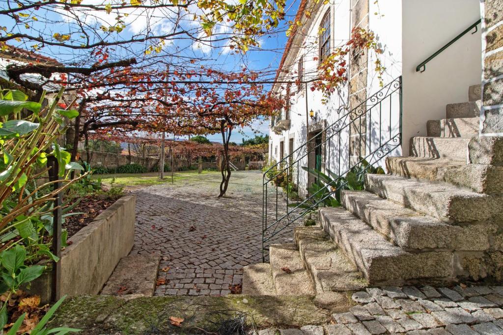 a set of stairs leading up to a house at Casa do Adro do Soajo in Soajo