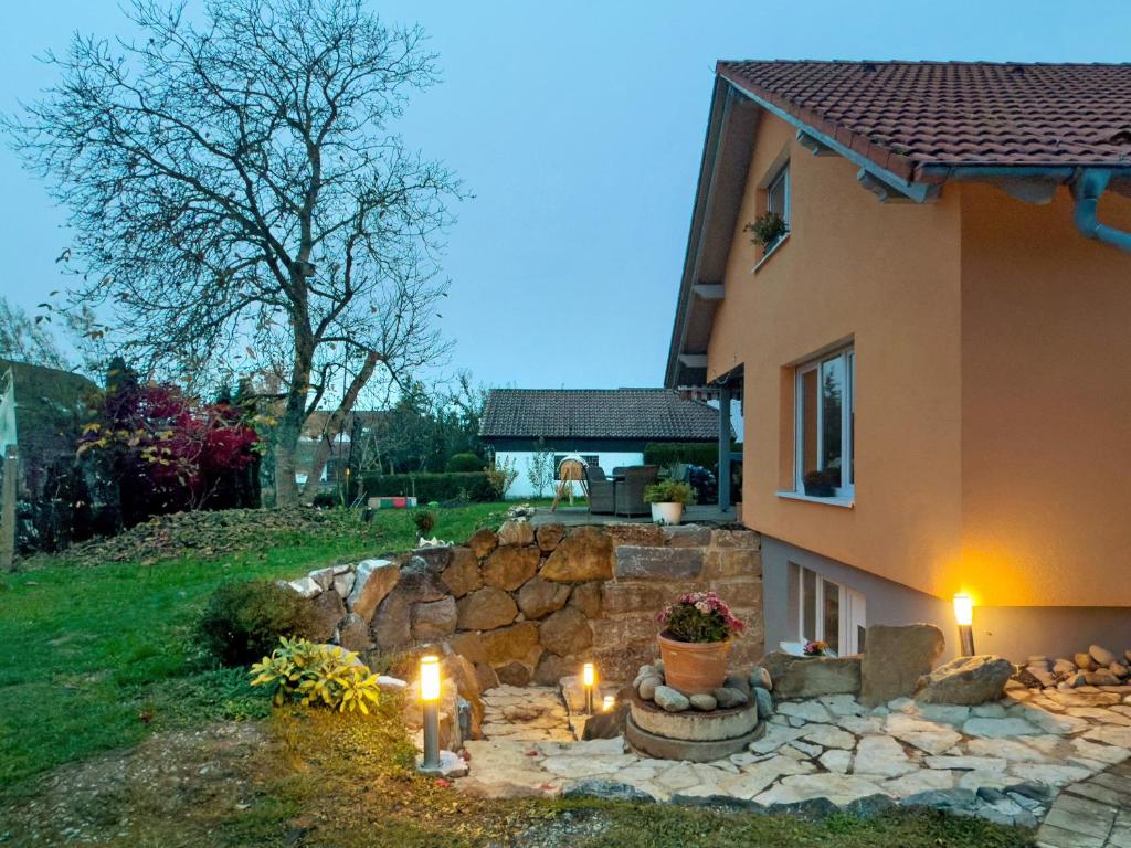 a house with candles in front of a yard at Carpe Diem in Altshausen