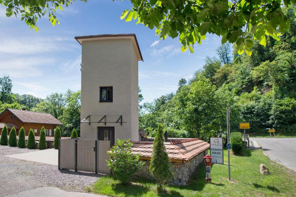 a small building with the letters ak on it at Gutenburgturm 18qm auf 3 Etagen in Waldshut-Tiengen