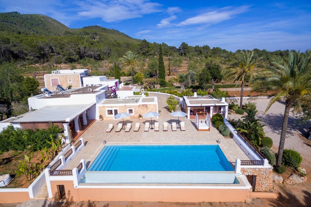 an aerial view of a house with a swimming pool at Can Pep Den Sitges in Sant Joan de Labritja