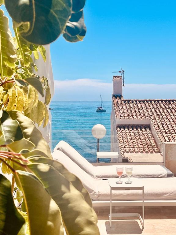 a living room with a view of the ocean at Villa Endless Summer in Estepona