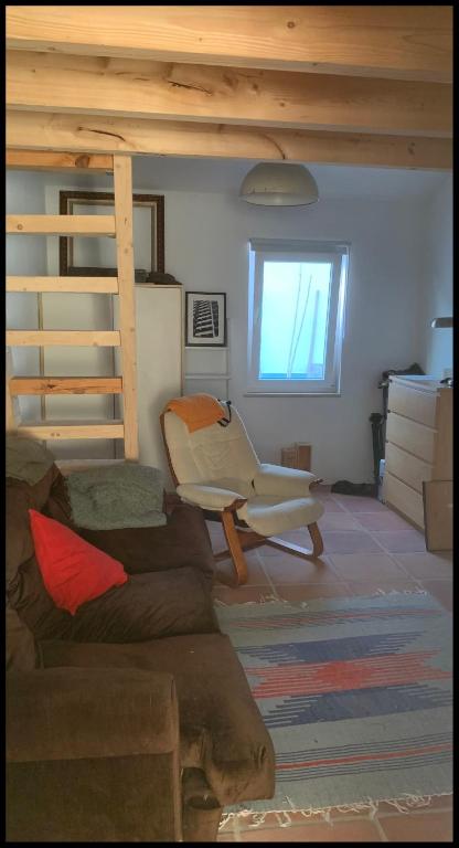 a living room with a bunk bed and a couch at Sítio Do Valverde in Coruche