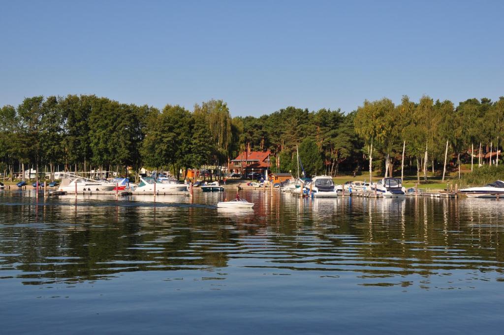 a group of boats are docked in the water at Ferienwohnung Maribell Jabel in Jabel