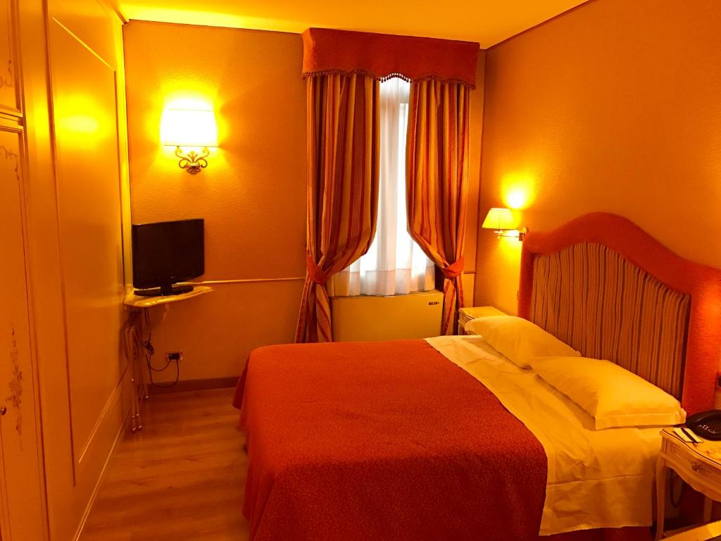 Postel nebo postele na pokoji v ubytování Casa Burchielle