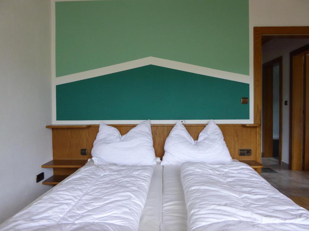 Postel nebo postele na pokoji v ubytování Haus Siebenbruenn