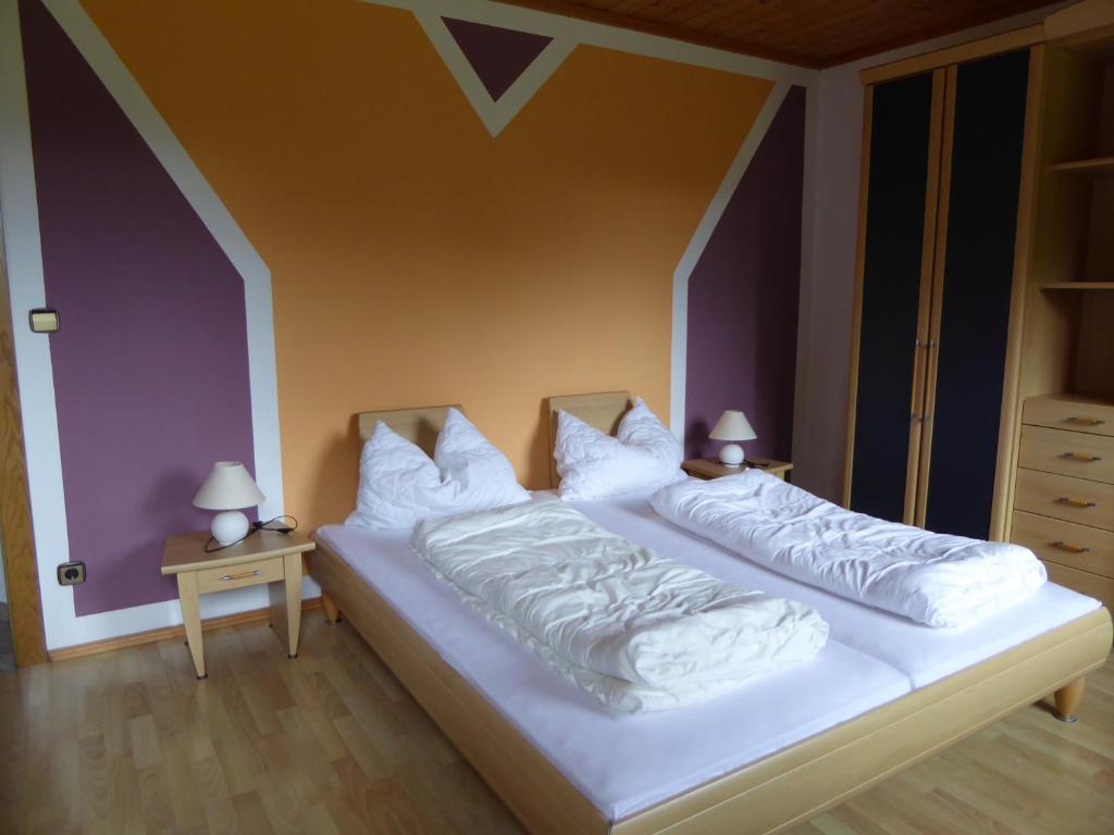 Postel nebo postele na pokoji v ubytování Haus Siebenbruenn