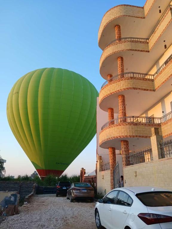 a hot air balloon in front of a building at KR Hotel in Luxor