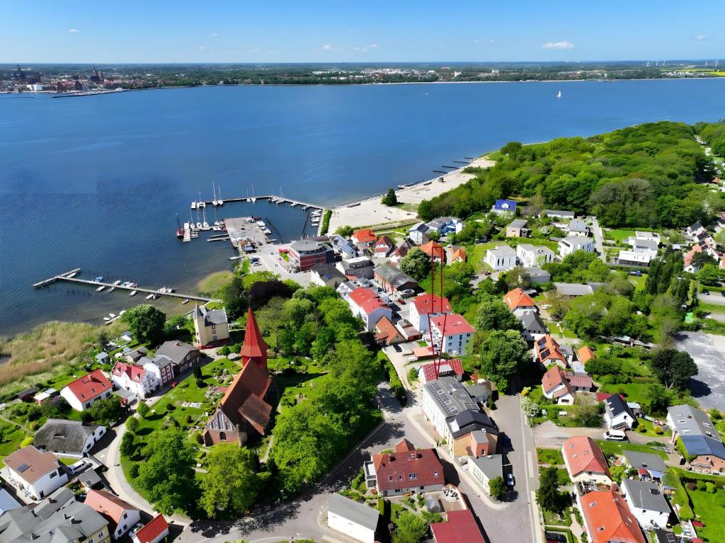 an aerial view of a small town next to the water at Fewo-meerblick-Rügen in Altefähr