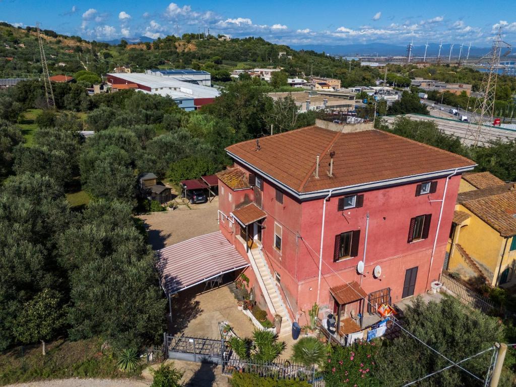 an aerial view of a large red brick building at La Casa Di Simba A Piombino in Piombino