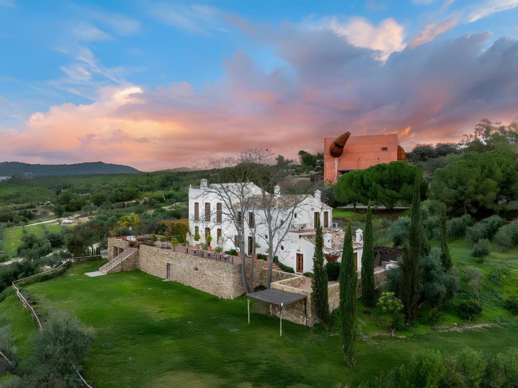 an aerial view of a building in a field at Cortijo La Almazara in Ronda