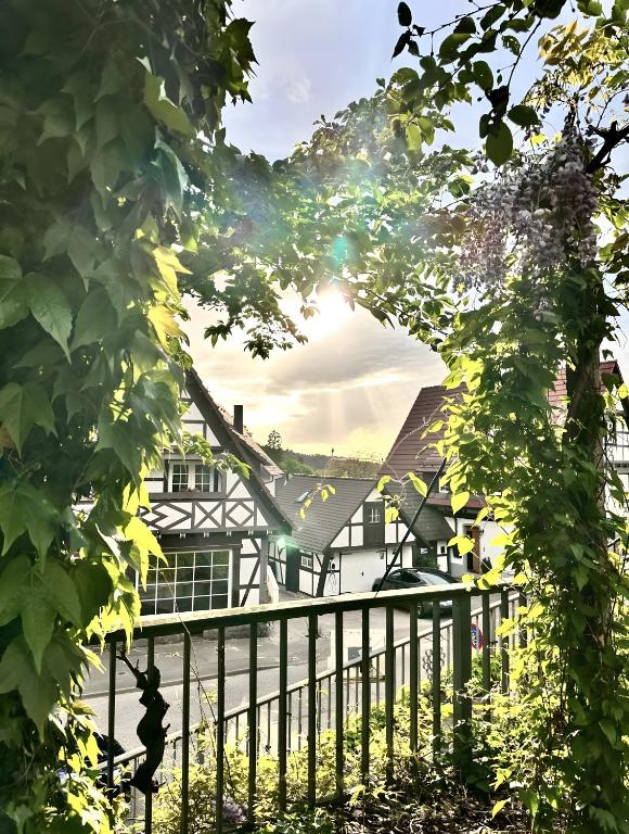 a view of a village through the trees at Schmuckkästle in Sasbachwalden