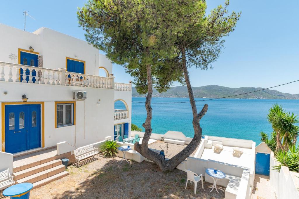 a villa with a view of the water at Wavedance Accommodation in Salamina