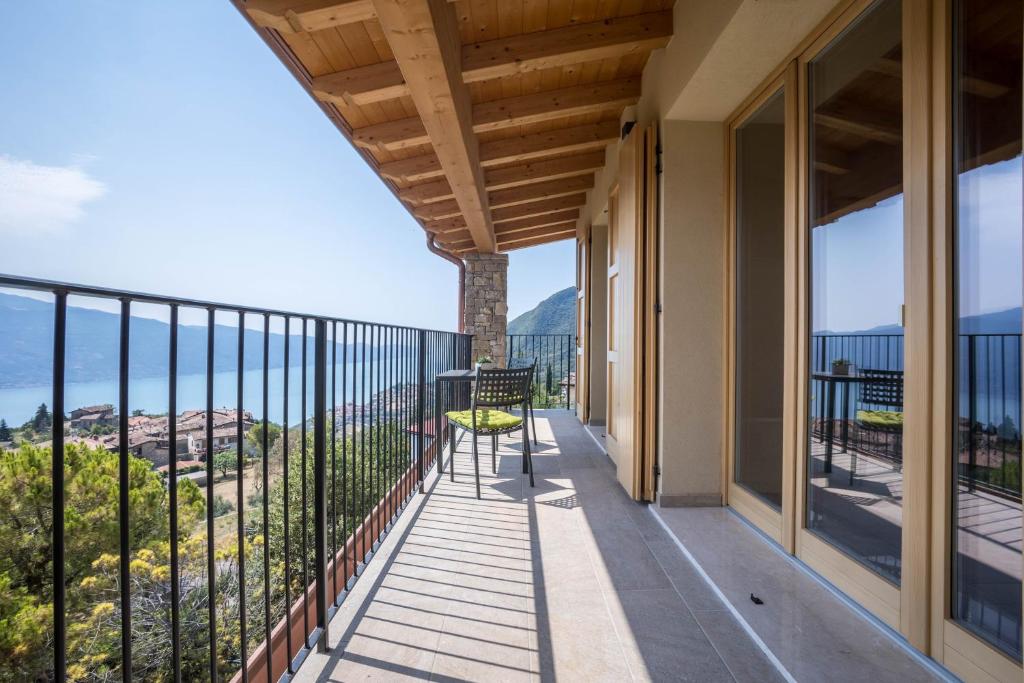 a balcony with a view of the ocean at Casa Panoramica in Tignale