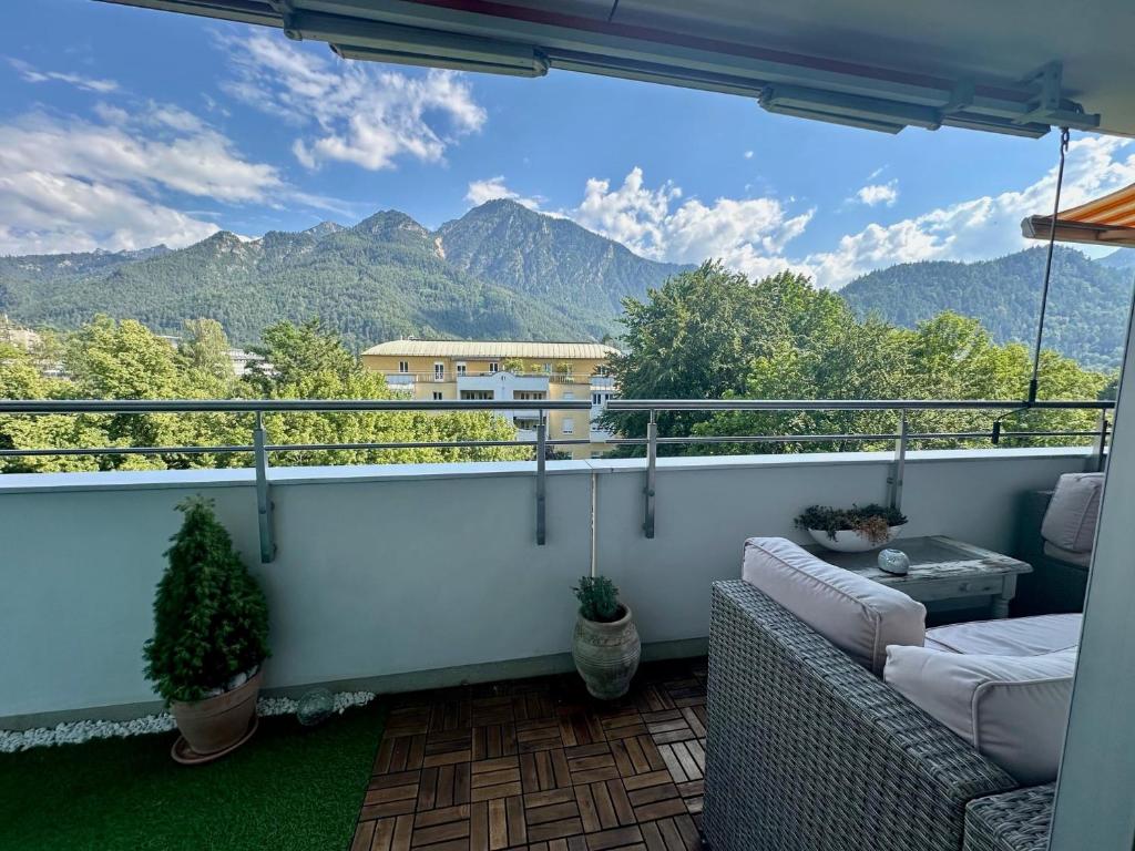 a balcony with a view of the mountains at The view 2 in Bad Reichenhall