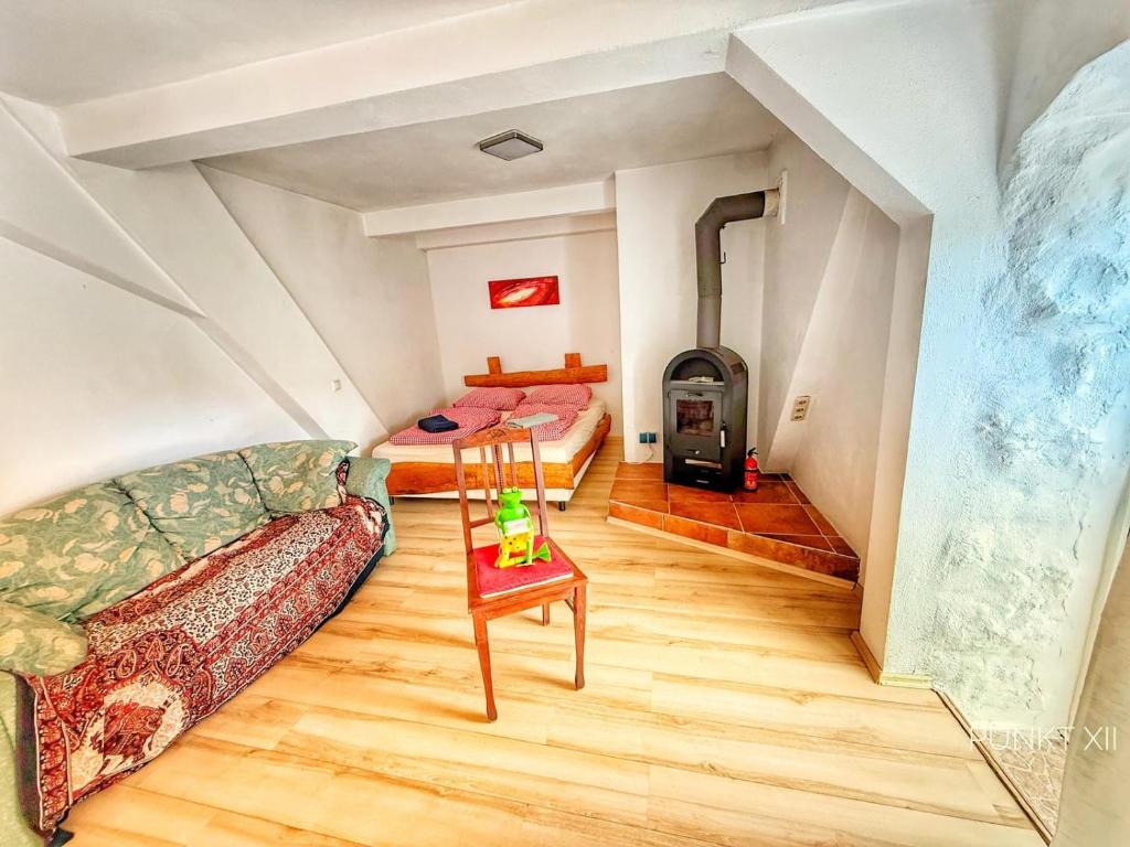 a living room with a couch and a table at Wohnung 3 in Burghaslach