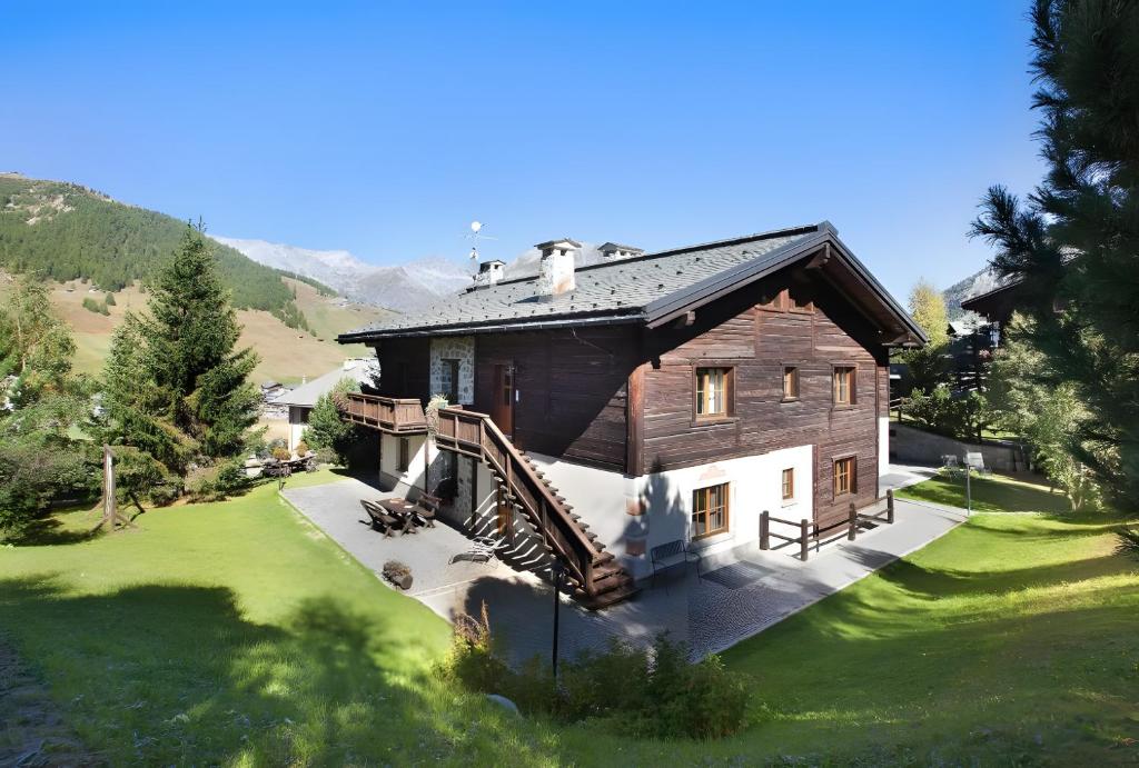 an aerial view of a house with a staircase at Chalet Sonne - Livigno in Livigno