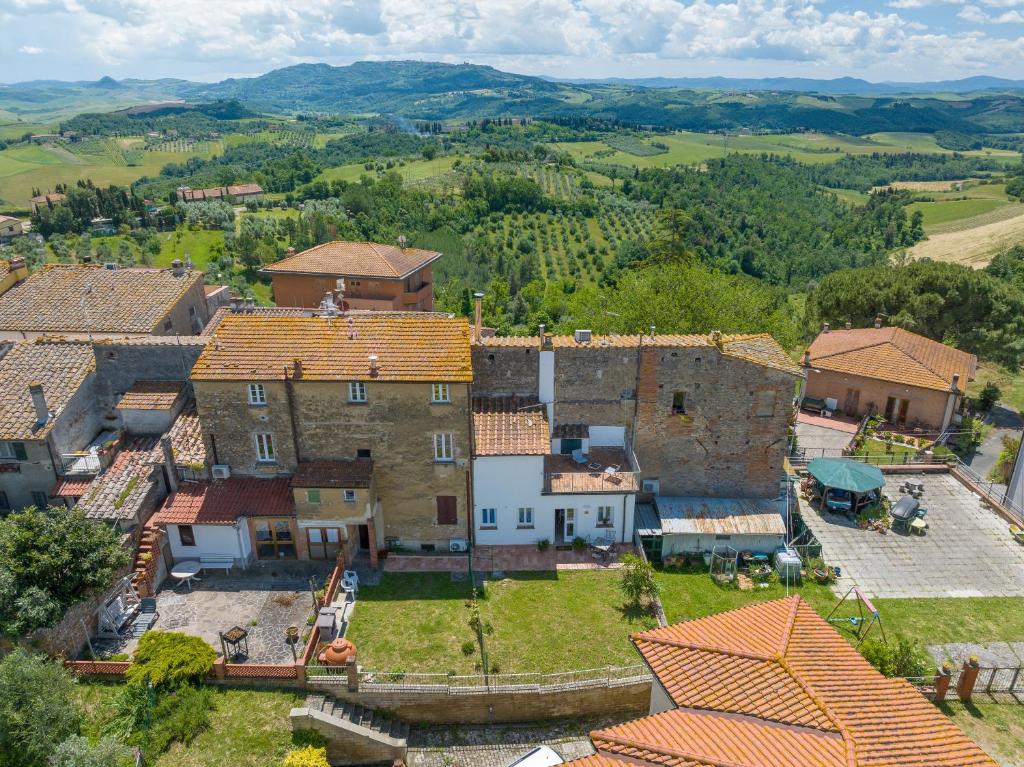 an aerial view of a large house with orange roofs at Lecasedicatia in Villamagna