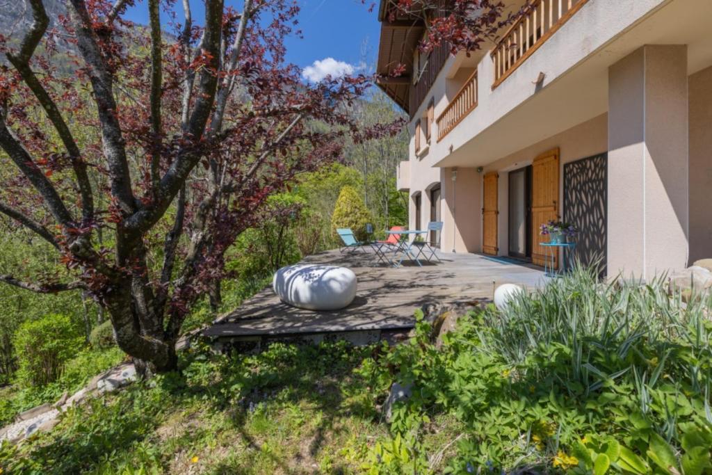 a house with pumpkins sitting on a patio at La Tour 74 in Thônes