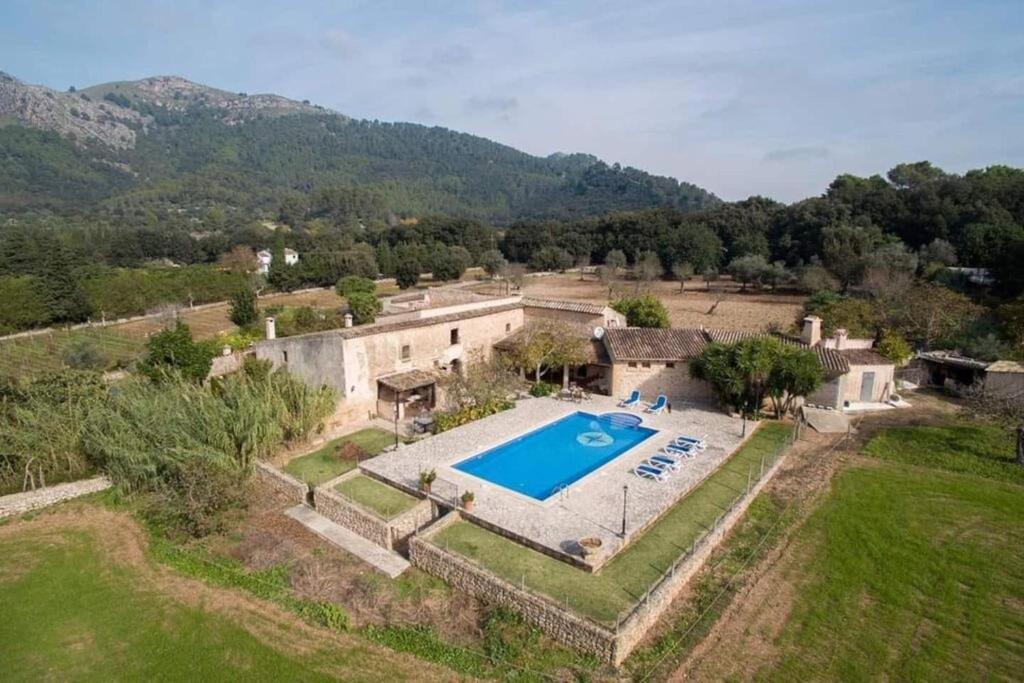 an aerial view of a house with a swimming pool at Plana Morro in Pollença