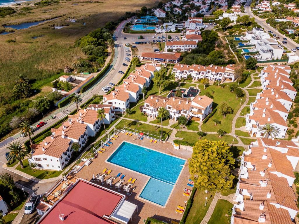 an aerial view of a resort with a swimming pool at Son Bou Gardens Plus 1 in Son Bou