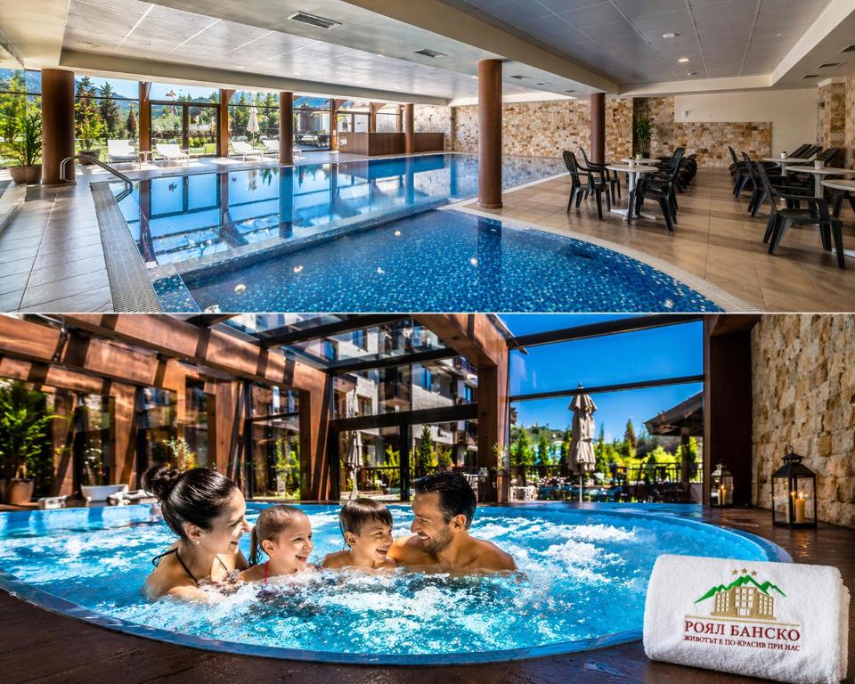 a family in a swimming pool at a hotel at Royal Bansko Family Apart Hotel - All Inclusive Light or Half Board & Drinks With Heated Indoor Pool & Jacuzzis in Bansko