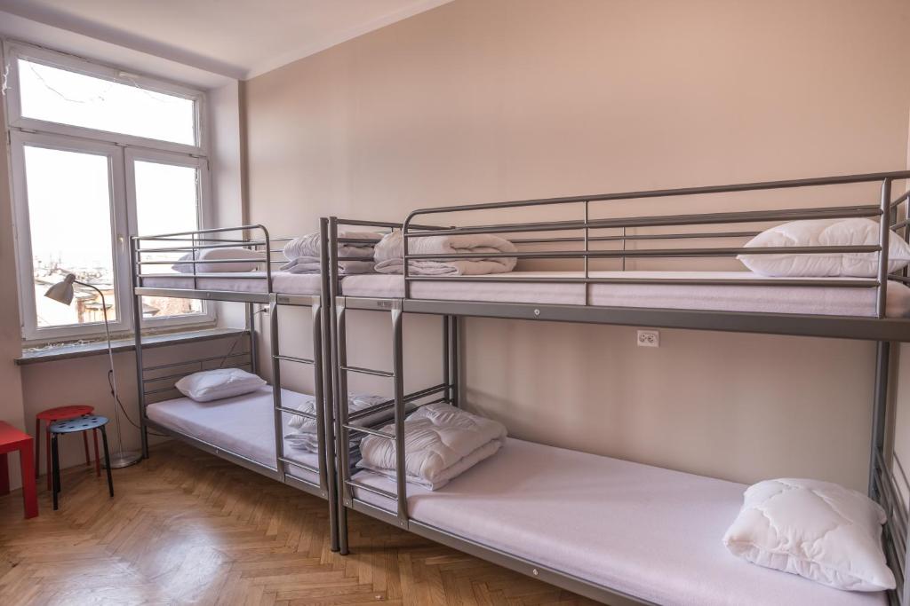 Posteľ alebo postele v izbe v ubytovaní Bubble Hostel