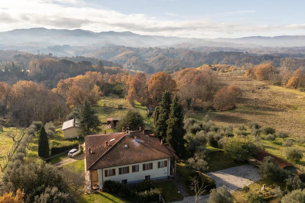 an aerial view of a house in the mountains at Poggio Loccano in Montevarchi