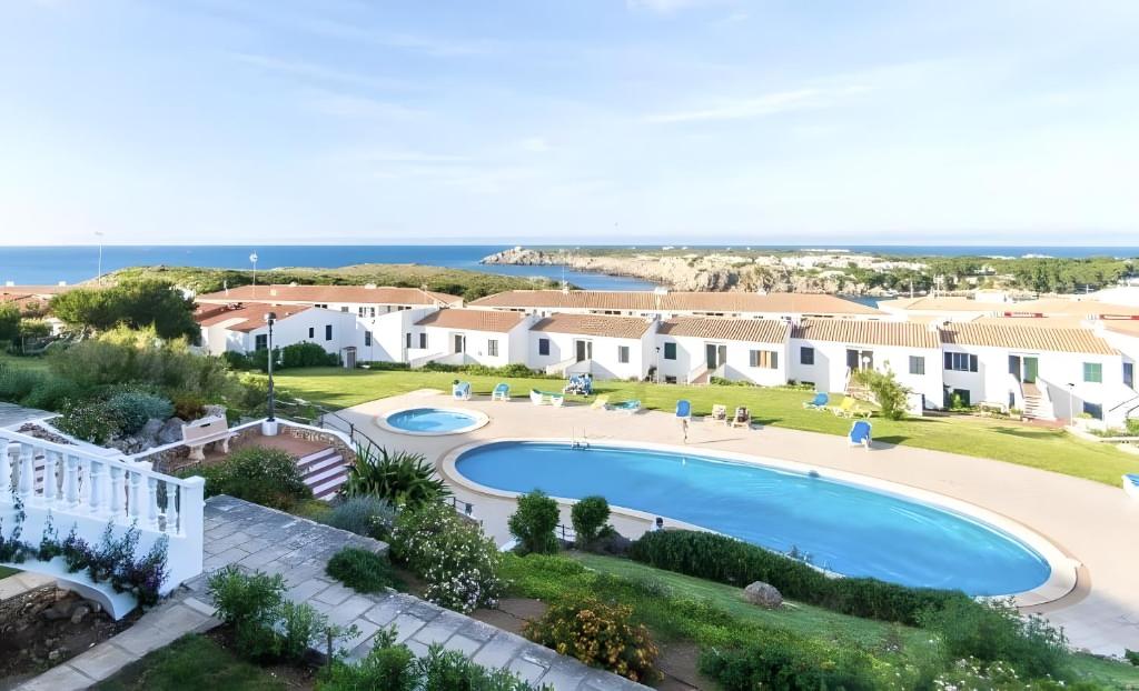 an aerial view of a villa with a swimming pool at Costa Arenal 5 in Arenal d'en Castell