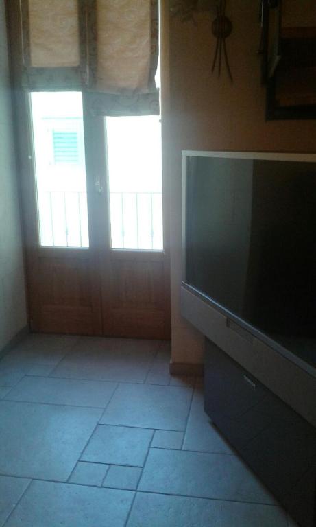 TV a/nebo společenská místnost v ubytování Portico dei Sassi