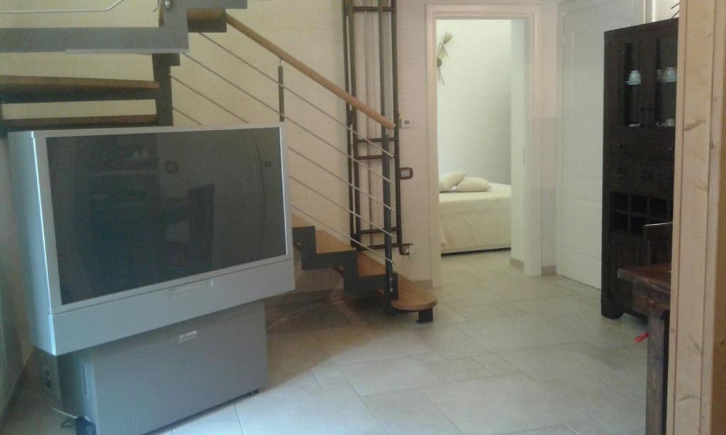 TV a/nebo společenská místnost v ubytování Portico dei Sassi