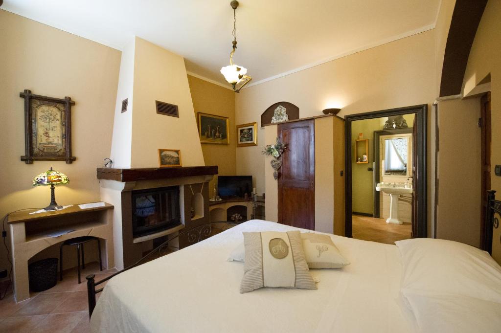 Postel nebo postele na pokoji v ubytování B&B Borgo Cortese