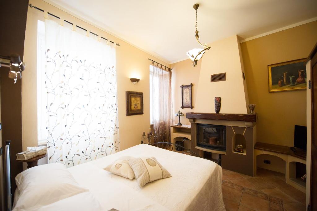 Postel nebo postele na pokoji v ubytování B&B Borgo Cortese