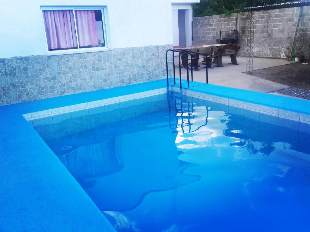 Bazén v ubytování Hostal Benjamin nebo v jeho okolí