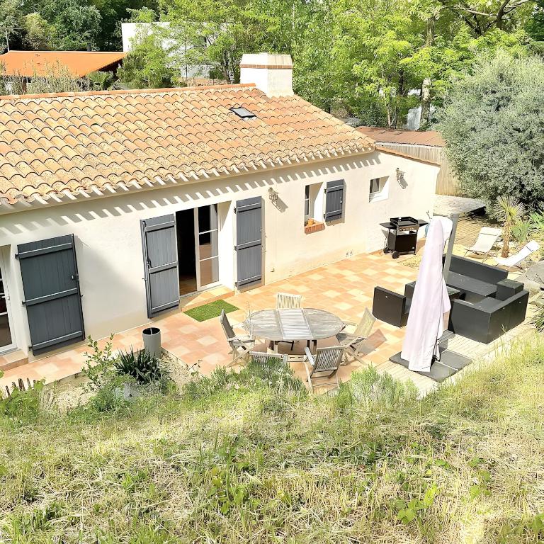 an aerial view of a house with a patio at La Maison Des Conches - Ref 803 in Longeville-sur-Mer