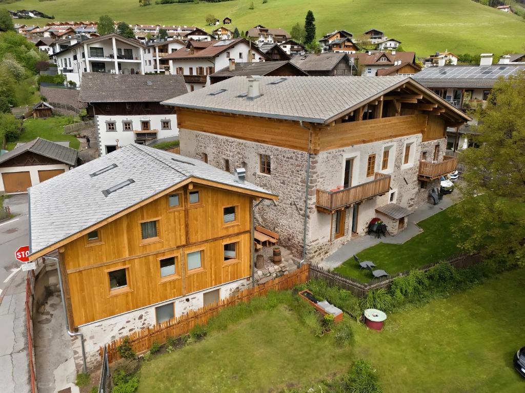 an aerial view of a large house in a city at Chalet’s Samer in Sarntal