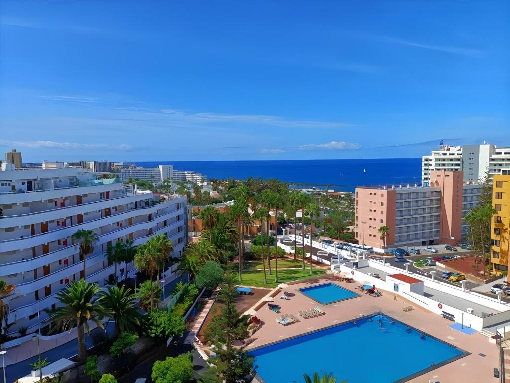an aerial view of a city with a swimming pool at Casa Marazul in Playa Fañabe