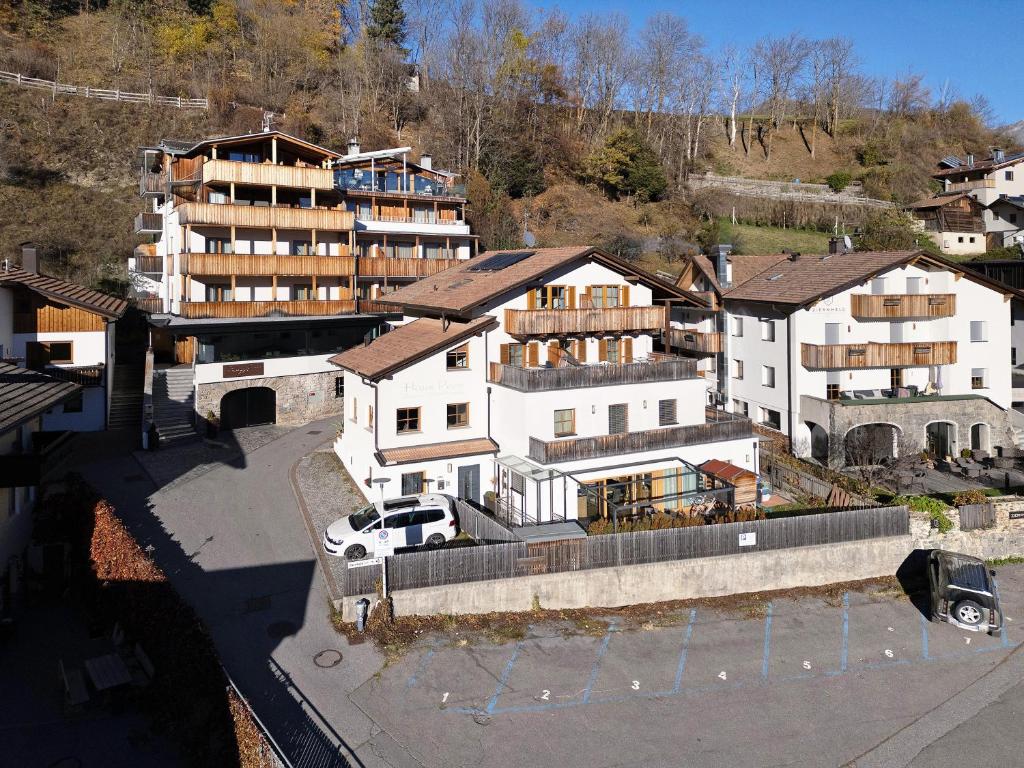 an aerial view of a building in a city at Haus Peer Burgeis in Malles Venosta