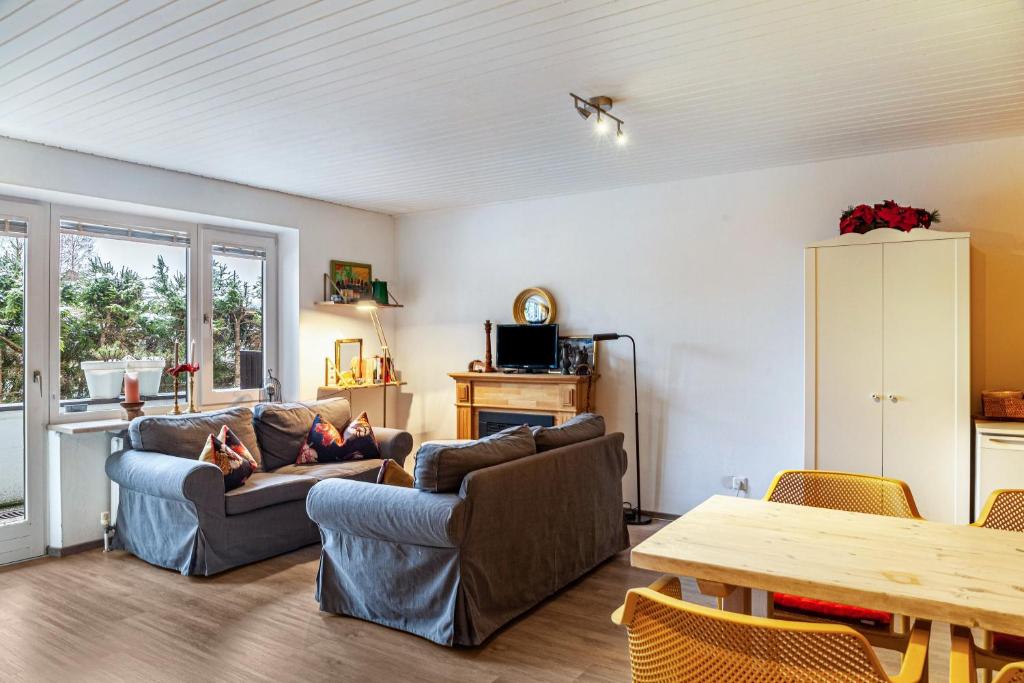 a living room with two couches and a table at Haus Excelsior Top 2 in Seefeld in Tirol