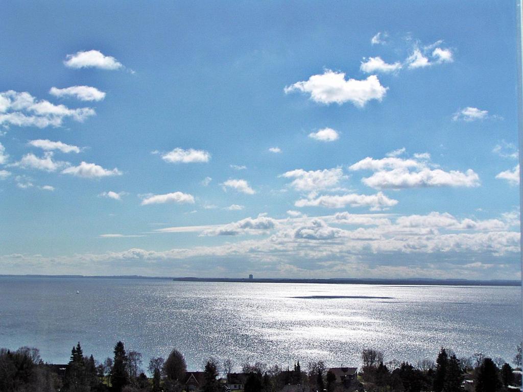a view of a large body of water at Wellness Penthouse Meerblick in Sierksdorf