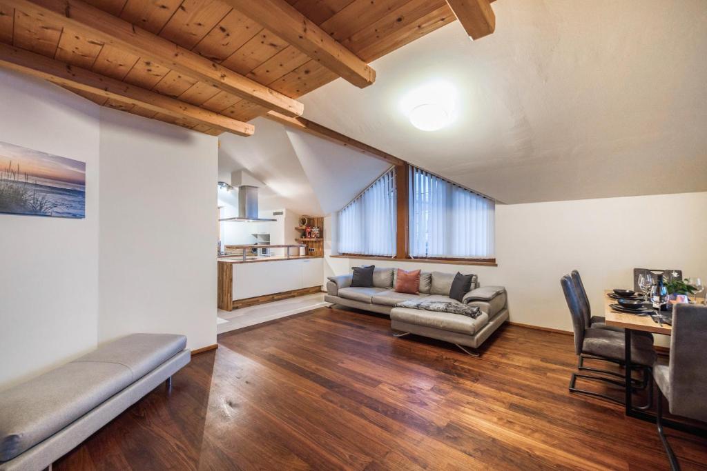 a living room with a couch and a table at Apartement Huck in Cornedo all'Isarco