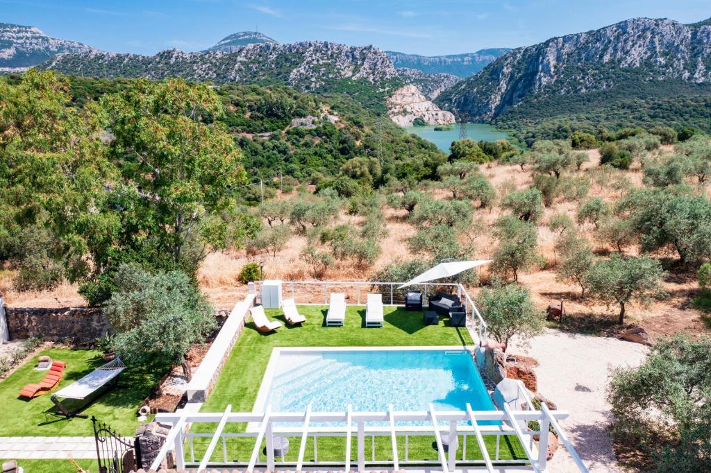 an aerial view of a villa with a swimming pool at Casa sul lago private heated pool in Dorgali