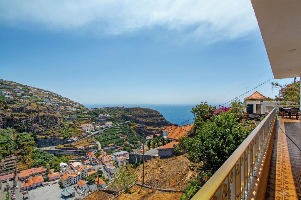 a view of a city from a balcony at Pico The Best View in Ribeira Brava