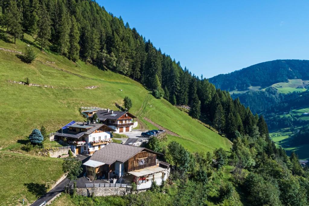 a house on the side of a hill at New - Steinhof Val di Mezzo in Val di Mezzo