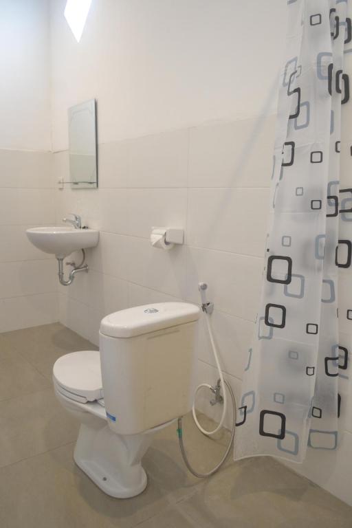 Koupelna v ubytování Akalanka Homestay