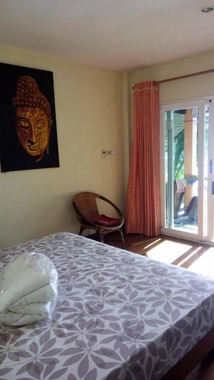 Postel nebo postele na pokoji v ubytování Paradise Palms